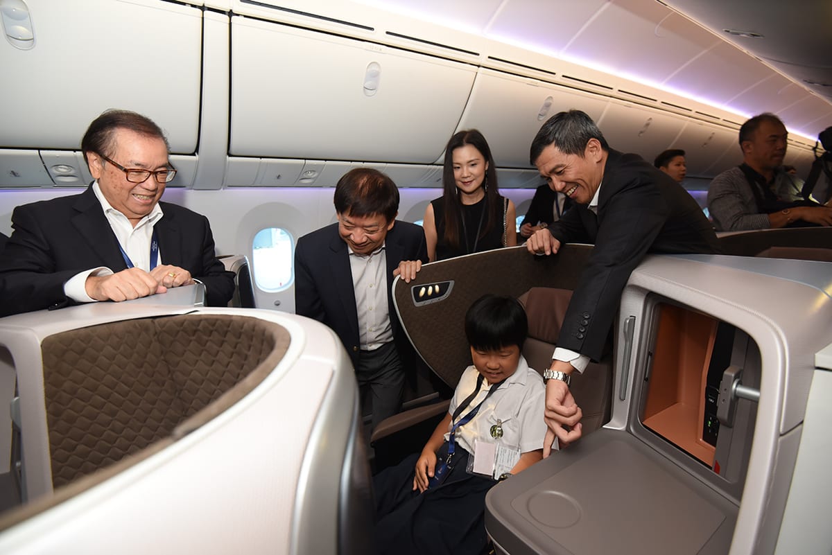 Minister, Chairman and Beneficiaries in Business Class